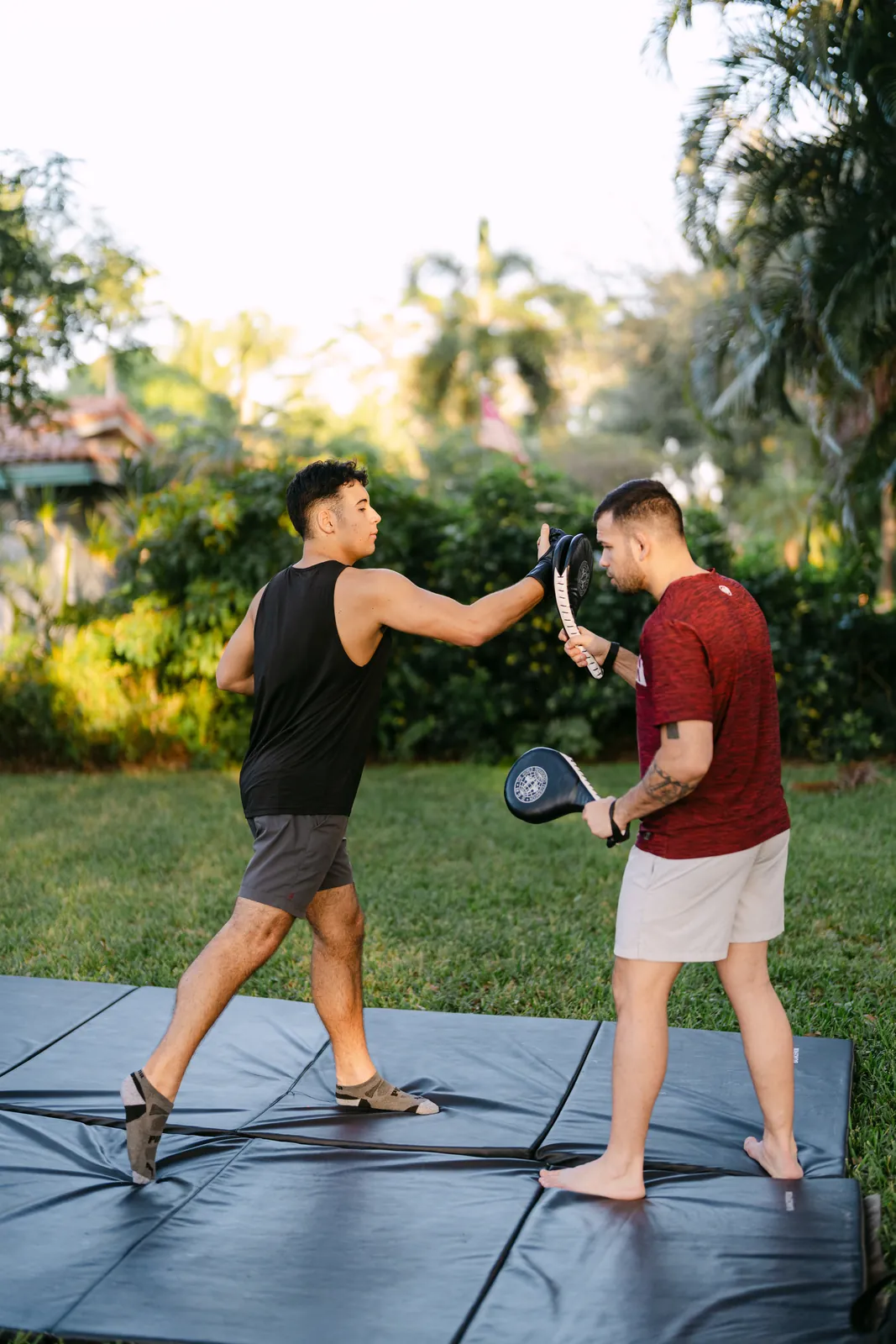 Outdoor kickboxing training with an instructor